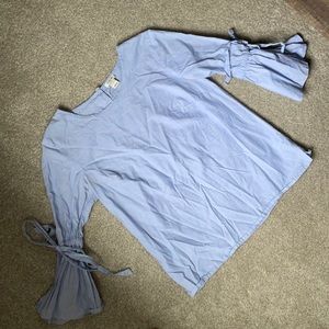 Blouse with tie sleeves